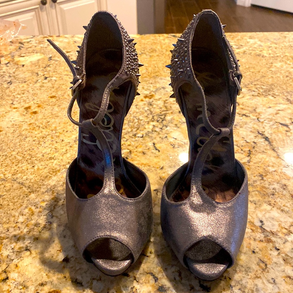 Sam Edelman pewter leather with pewter colored satin on back of stiletto heels.